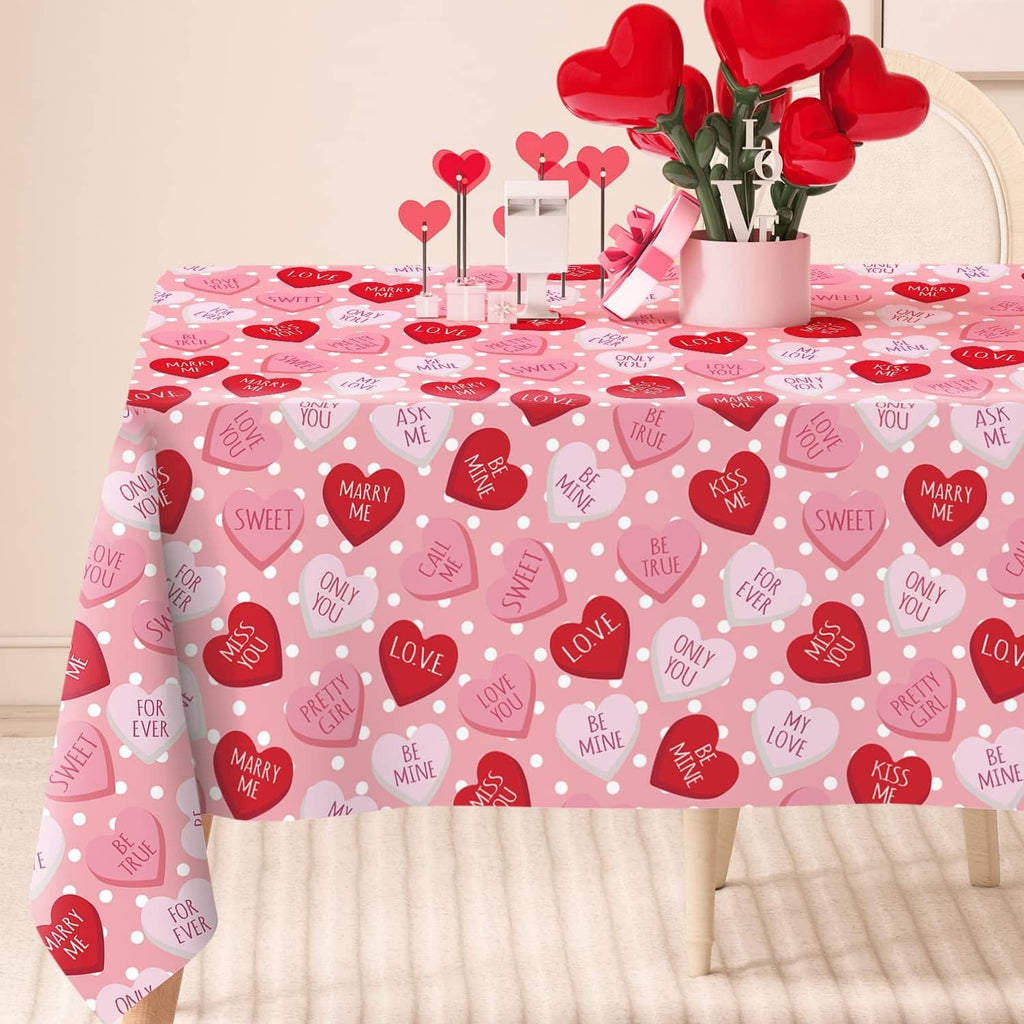 Pink rectangular tablecloth with red and pink hearts and romantic message icons