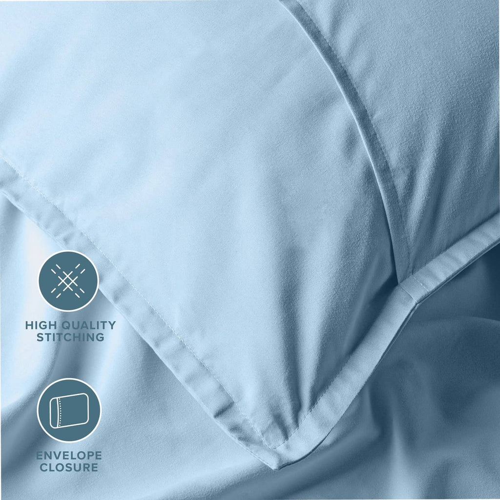 Light blue microfiber pillow sham with double-stitch seam and piped edges.