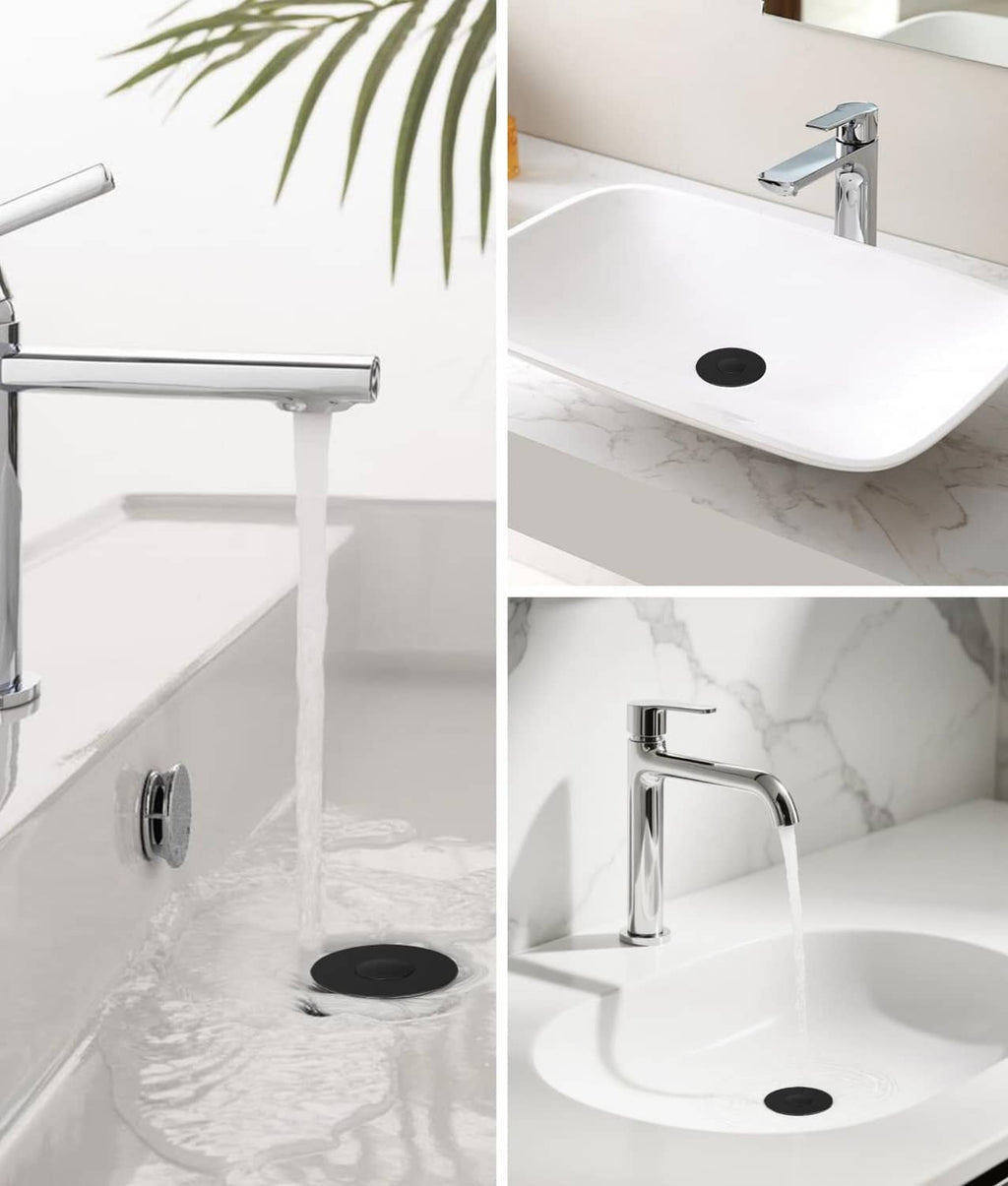 Black bathroom sink stopper installed in a white sink drain opening
