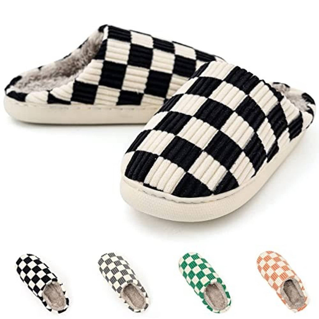Pair of fuzzy slide house slippers in black-and-cream plaid with thick cushioned base
