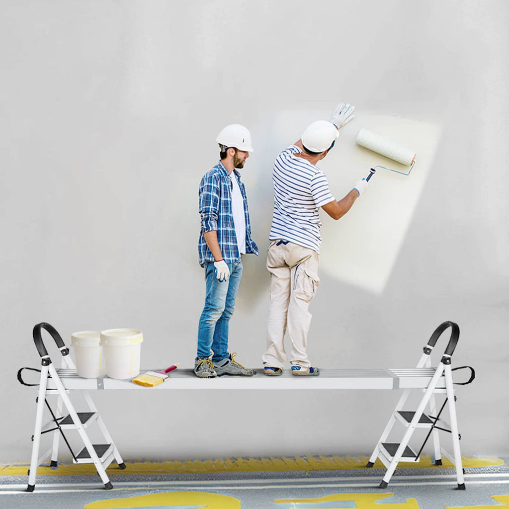 Aluminum scaffold plank set across two ladders with black strap handles