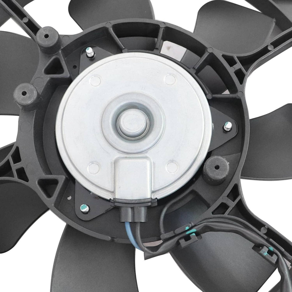 Close-up of fan motor hub with silver cover and black blade frame