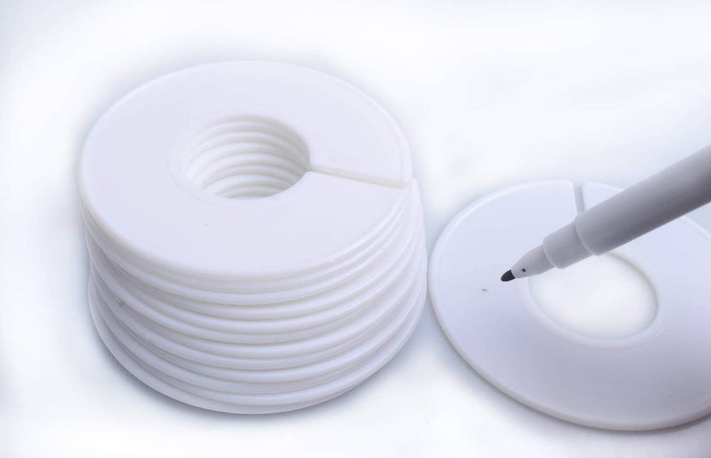 White round clothing rack dividers with circular center hole and marker pen