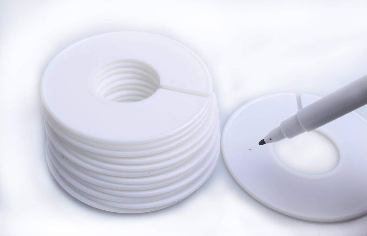 White round clothing rack dividers with circular center hole and marker pen