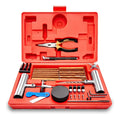 Red tubeless tire repair kit in molded case with pliers, driver, and plug tools