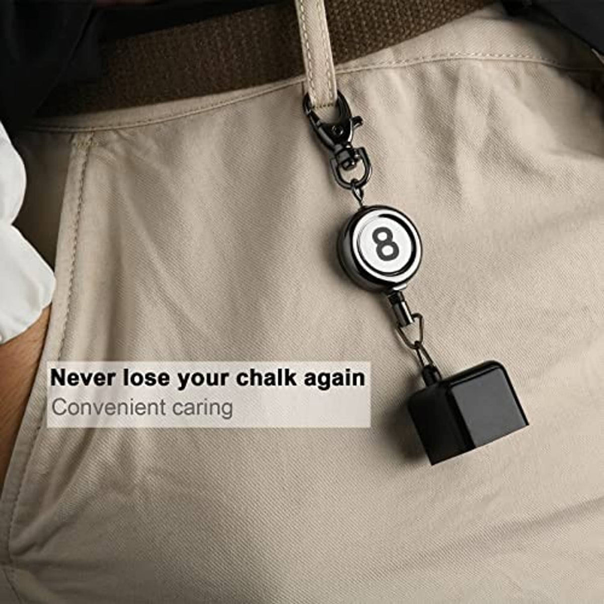 Billiard cue chalk holder keychain clipped to beige fabric pocket with 8 ball charm