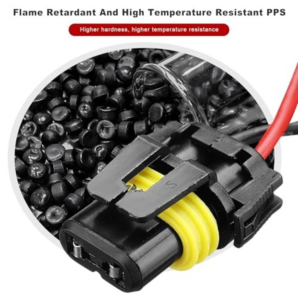 Close-up of black headlight socket connector with yellow seal and red wire