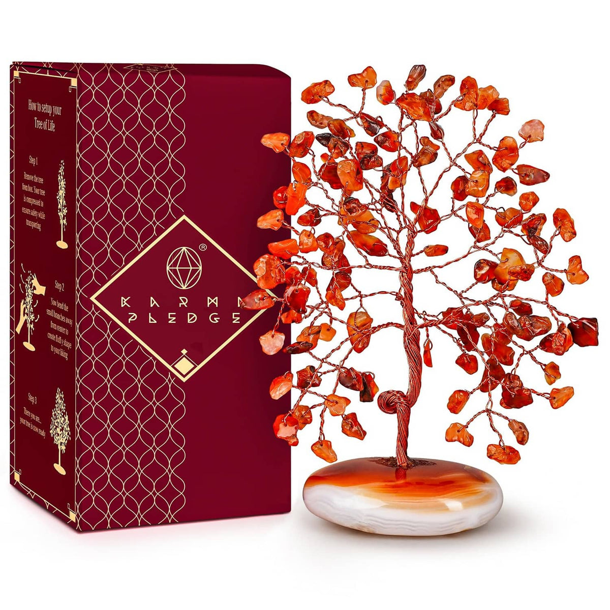Carnelian crystal tree figurine with orange-red stones and white palm-stone base