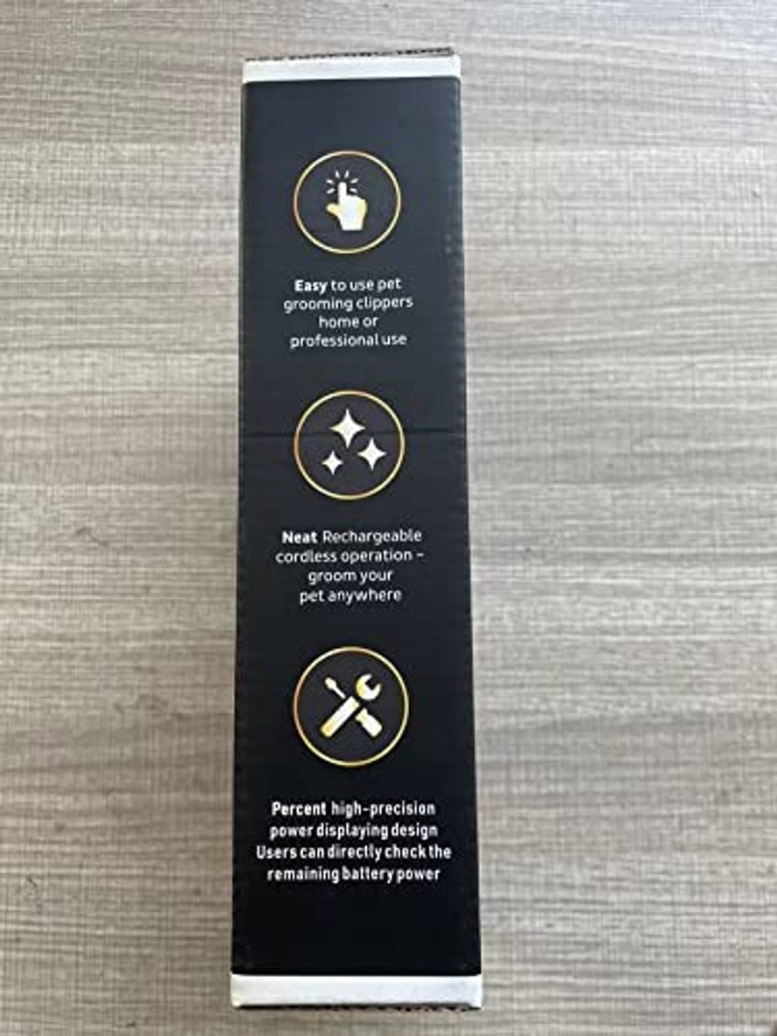Pet grooming clippers box with feature icons and professional-use text