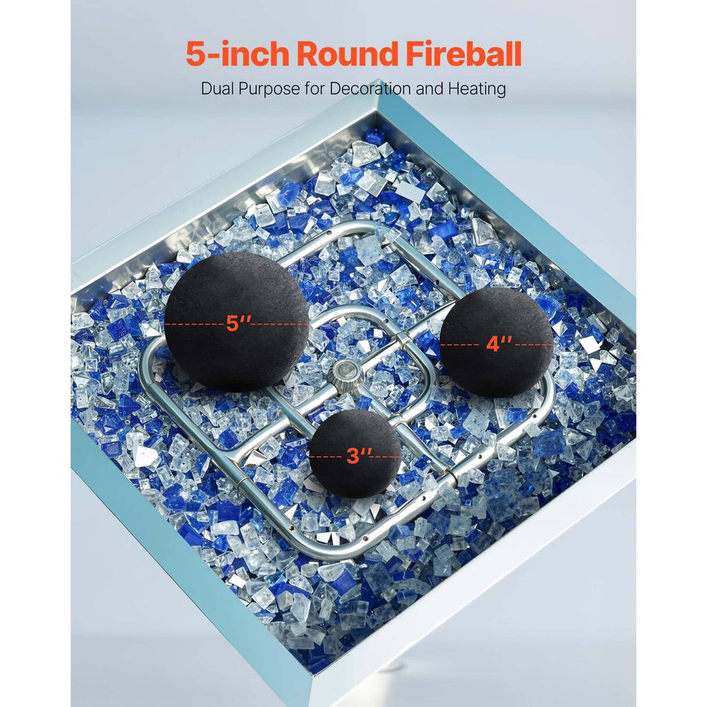 Black round ceramic fire balls in a tray with blue fireproof stones