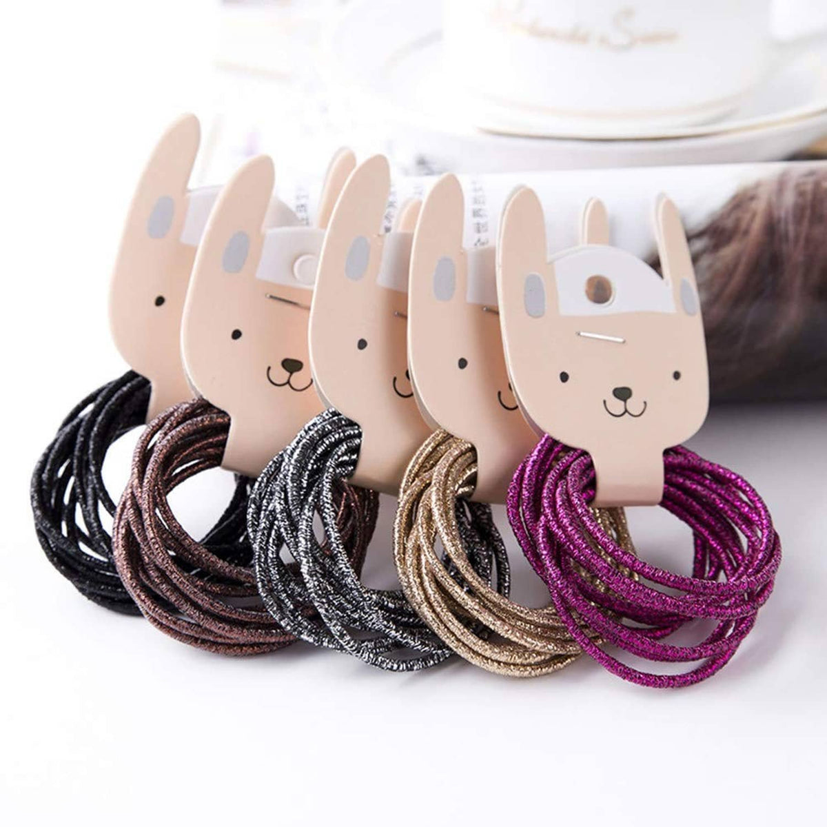 Glitter hair elastics on bunny face holders with mixed metallic loop colors