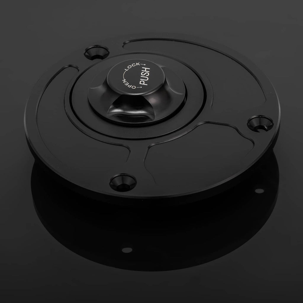 Black fuel tank cap with push-lock button center and four mounting holes