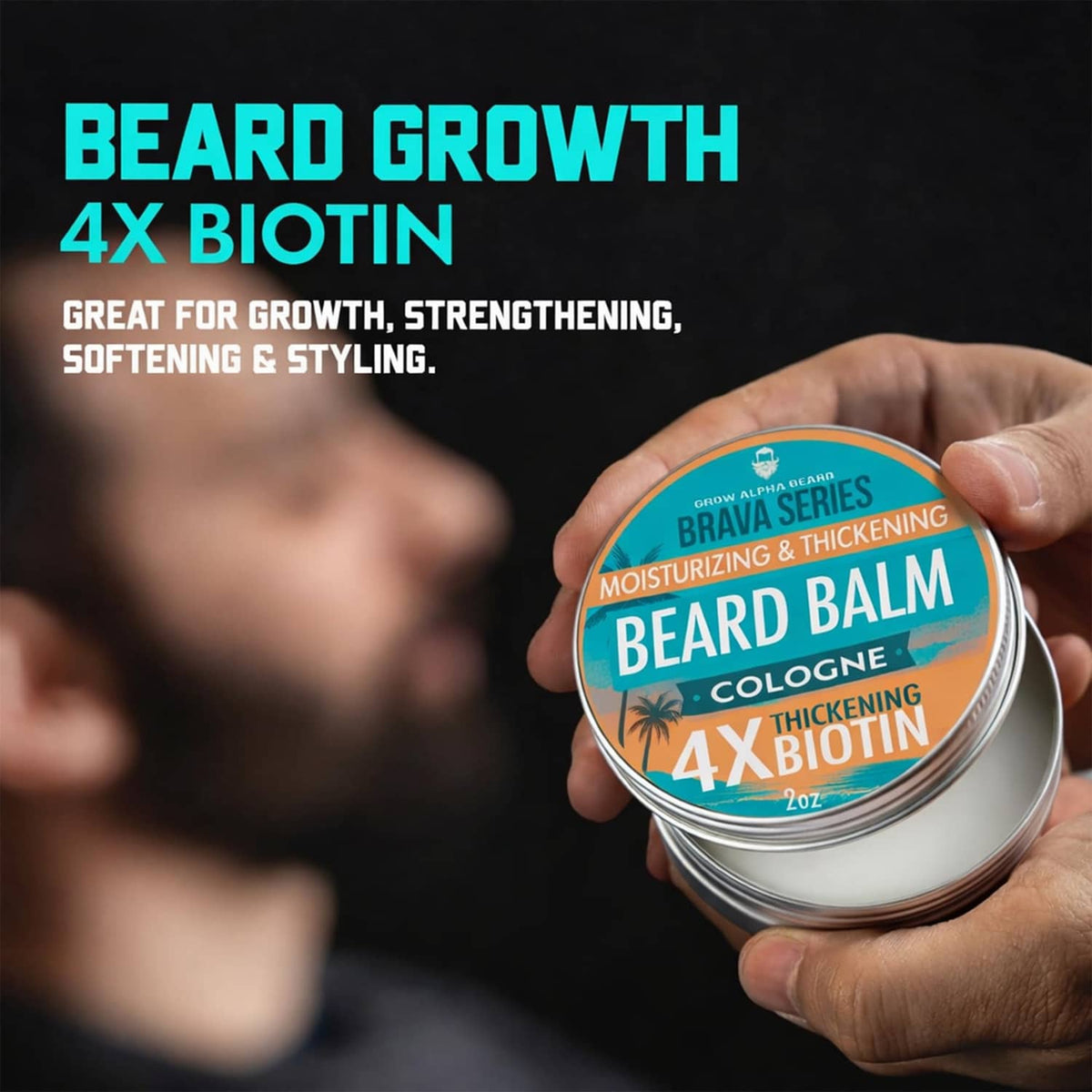 Hand holding 4x biotin beard balm tin, cologne, moisturizing thickening, 2 oz silver lid