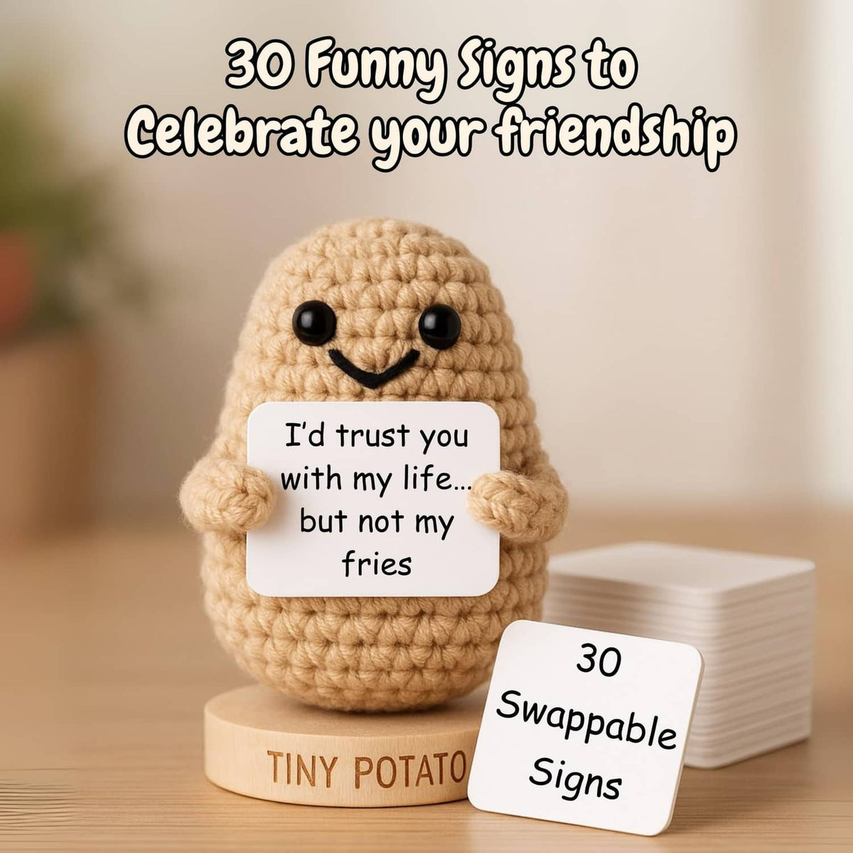 Crochet potato figurine on wooden base with a small swap sign card