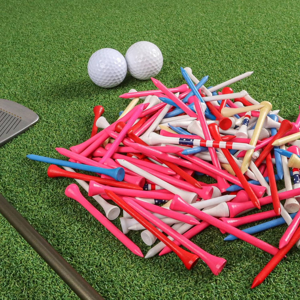 Mixed-color wooden golf tees pile on green turf