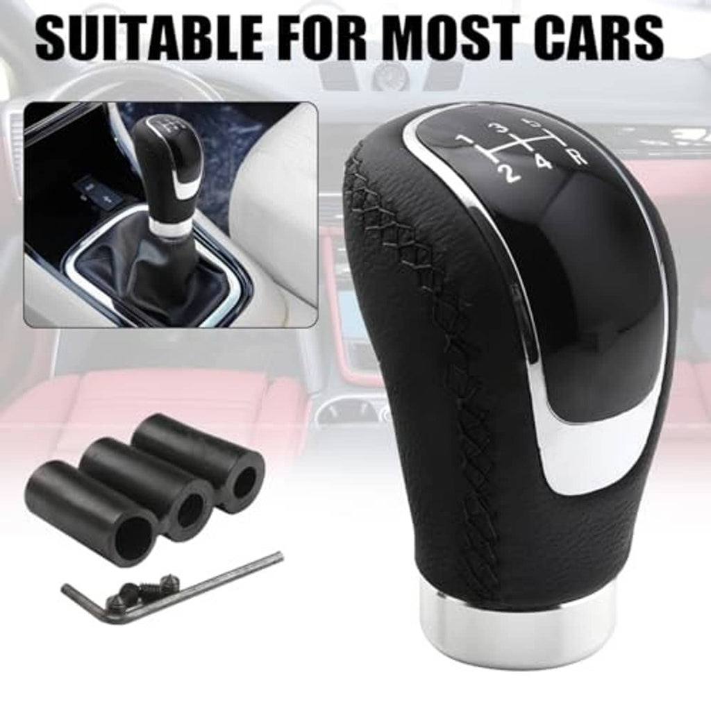 Black leather 5-speed gear shift knob with silver trim, shown with spare caps and tool