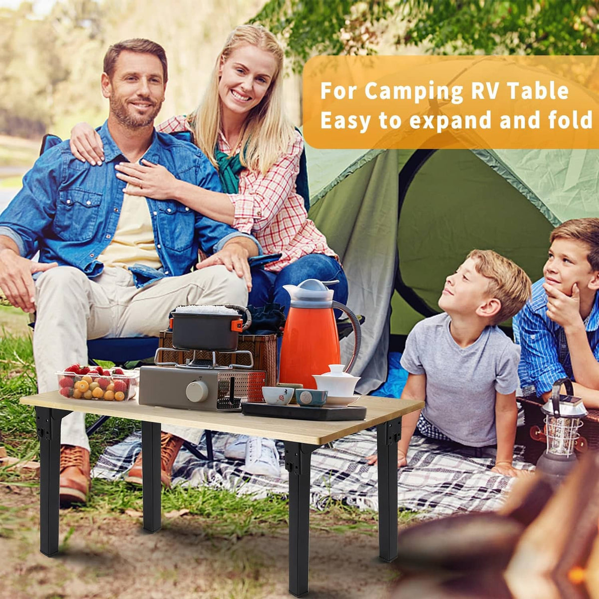 Black folding table legs under an outdoor camping table, expanded and locked