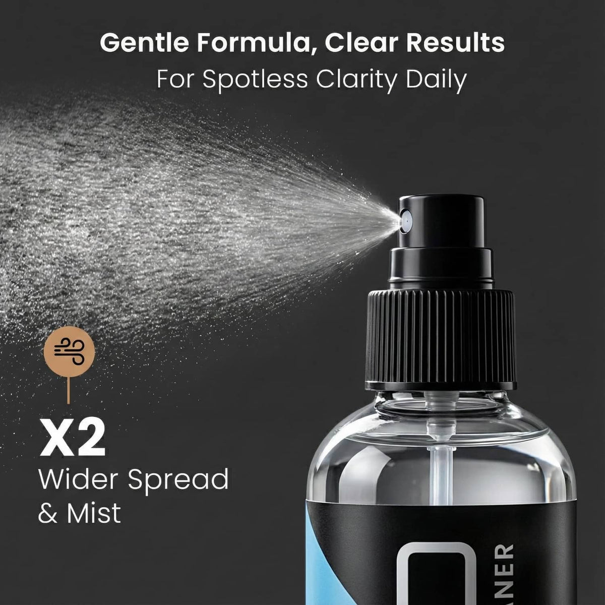 Lens cleaning spray bottle emitting fine mist, black cap