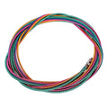 Coiled steel bass strings in teal, purple, and gold with metal end hardware loops