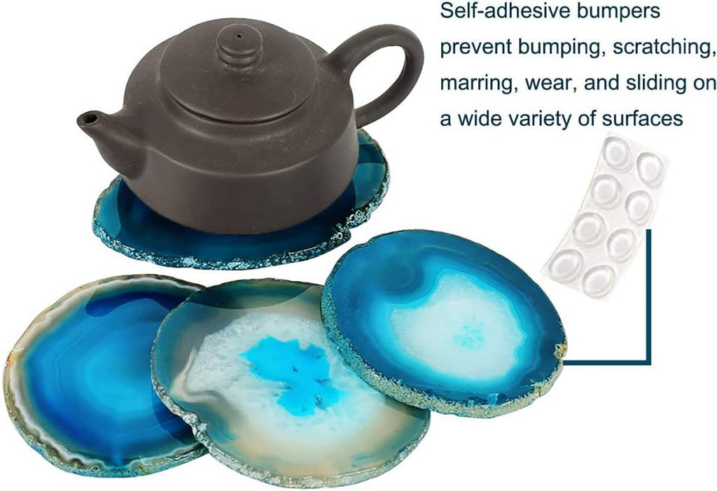 Teal agate geode coasters set with self-adhesive bumpers, beneath a dark teapot