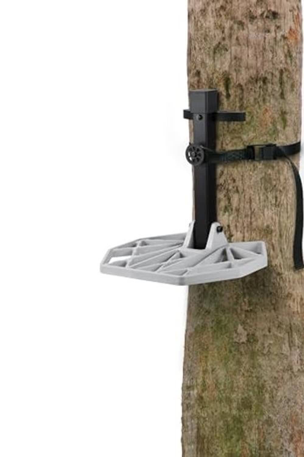 Black climbing strap on tree trunk with white-gray treestand footrest bracket