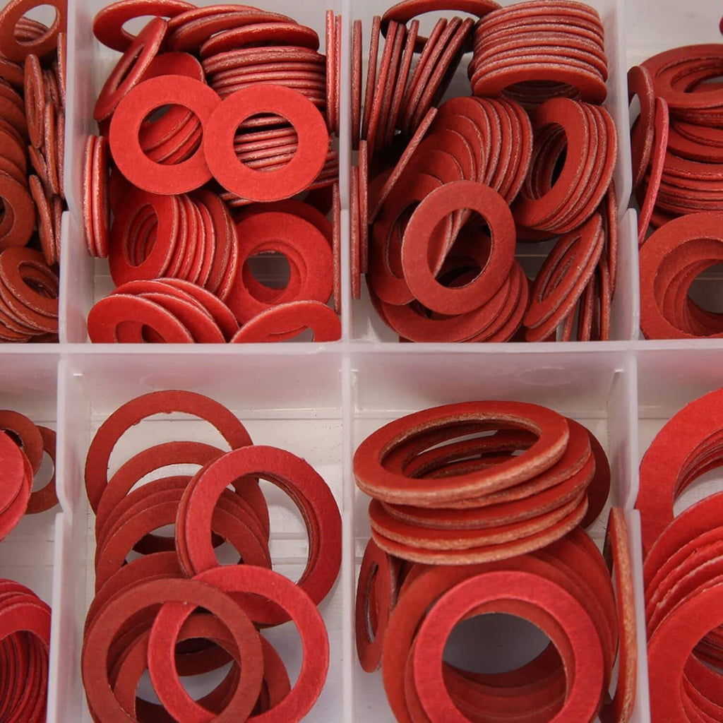 Close-up of red ring washers stacked in clear box compartments