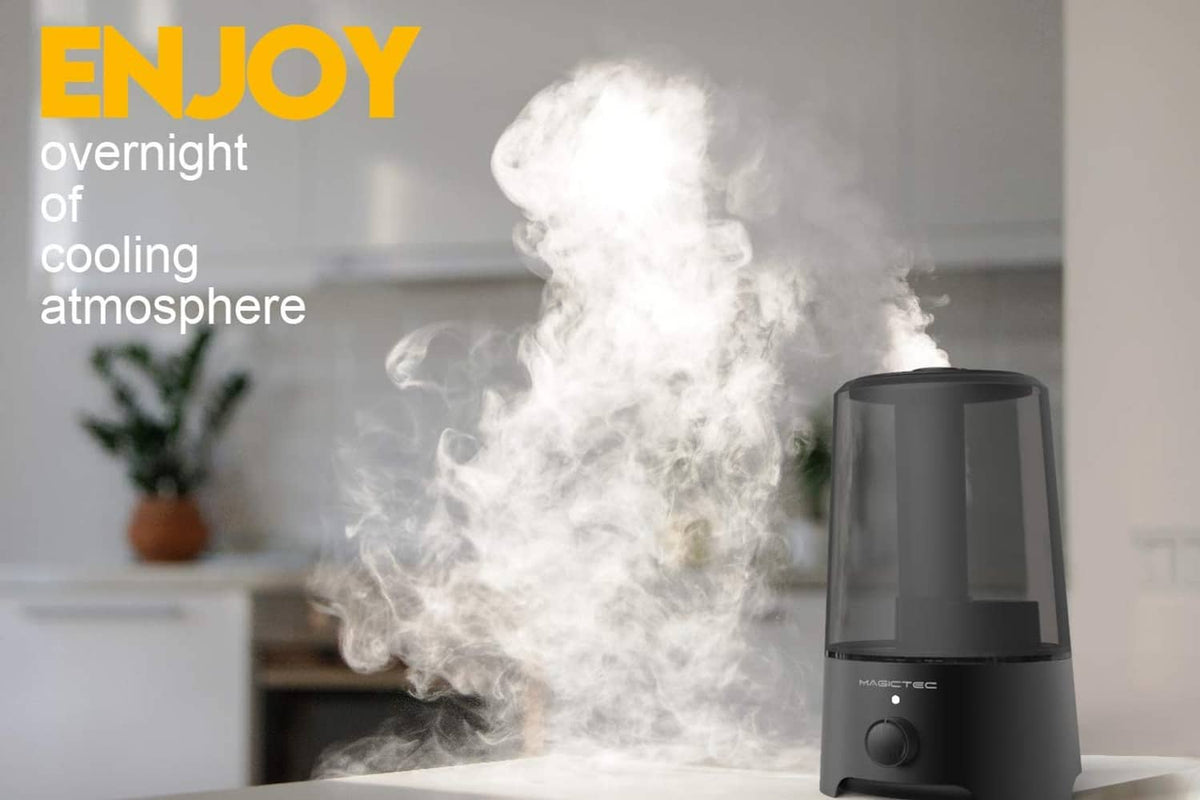 Black cool mist humidifier releasing visible steam from top outlet