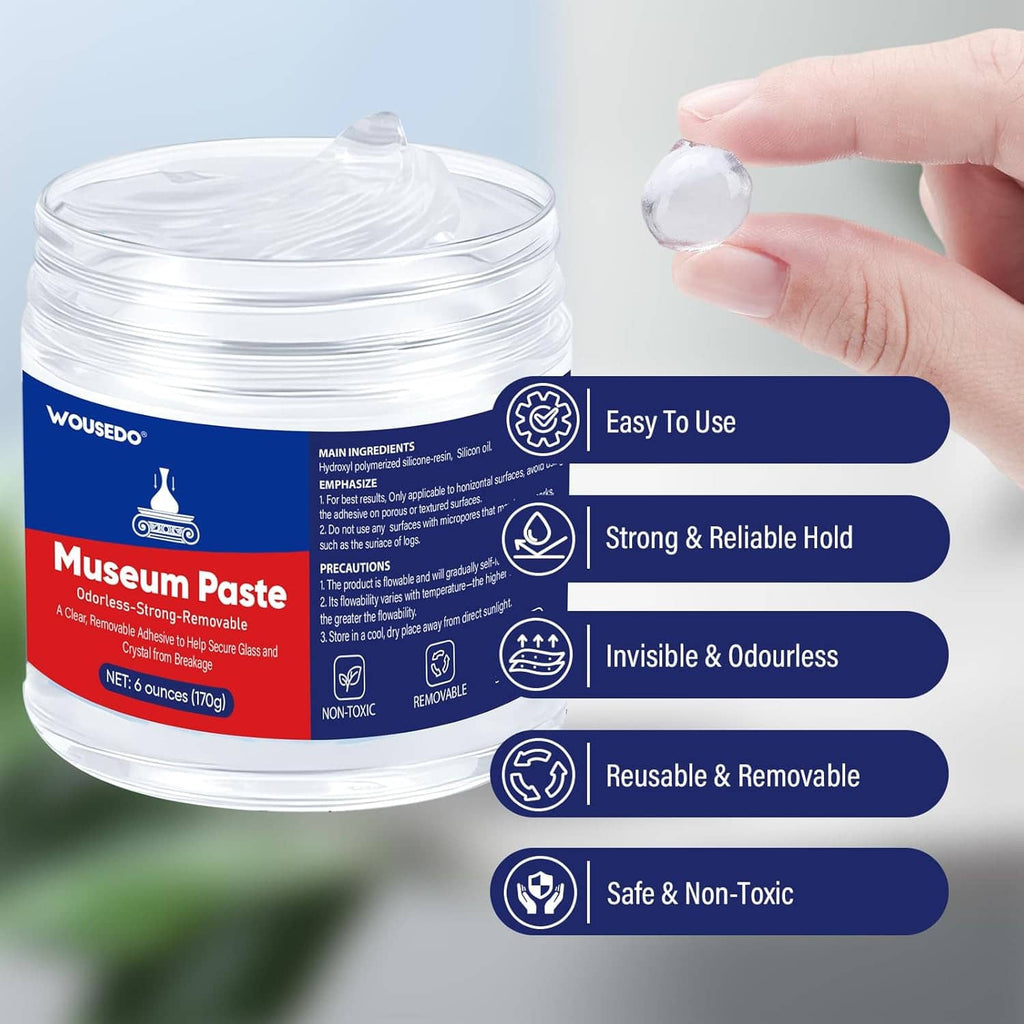 Clear removable gel wax museum paste jar with a translucent gel ball held by fingers