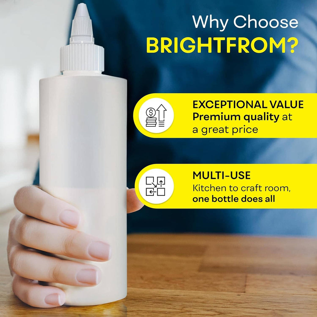 Empty white condiment squeeze bottle with twist cap, held in a hand