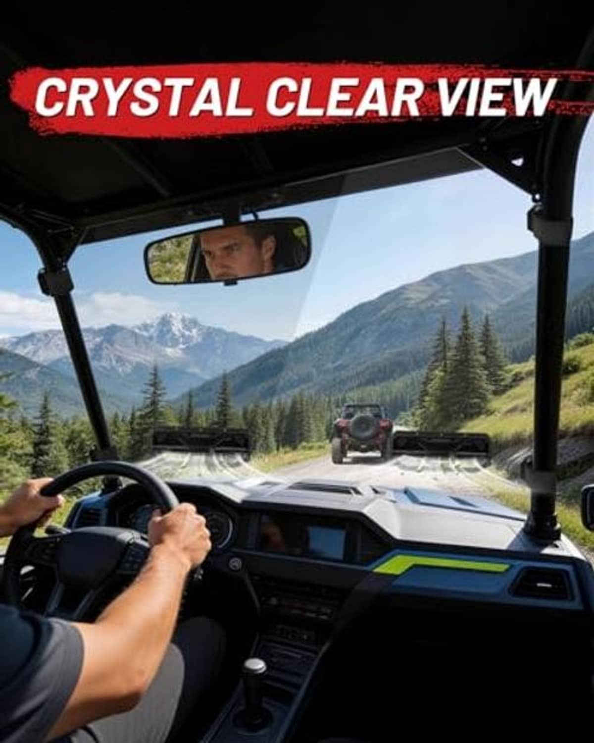 UTV crystal-clear windshield view from driver seat with dashboard and controls visible