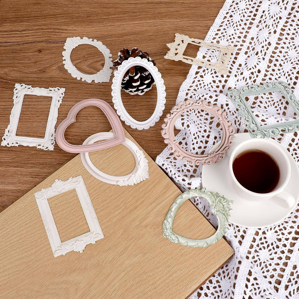Assorted lace scrapbook frames and borders with decorative cutouts, white and pastel rings and squares.