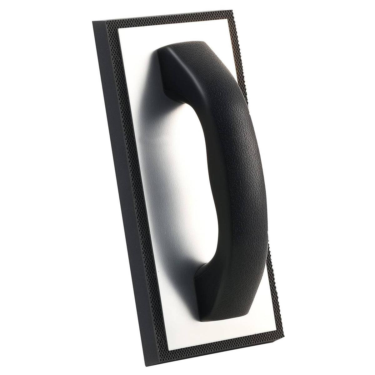 Rubber grout float with curved non-slip handle, textured sole for tile work