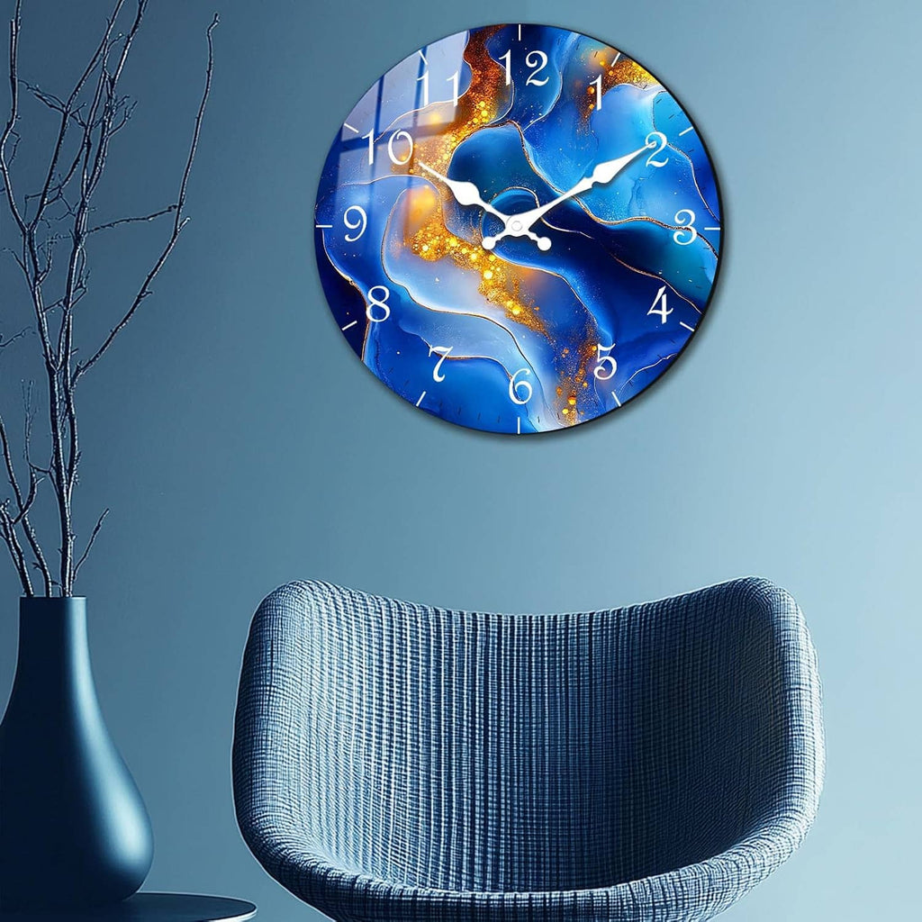 Wall-mounted blue marble round clock with gold streaks, white hands, and numbered face