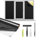 Blackout window film roll, dark sheet material, and included installation tools for windows