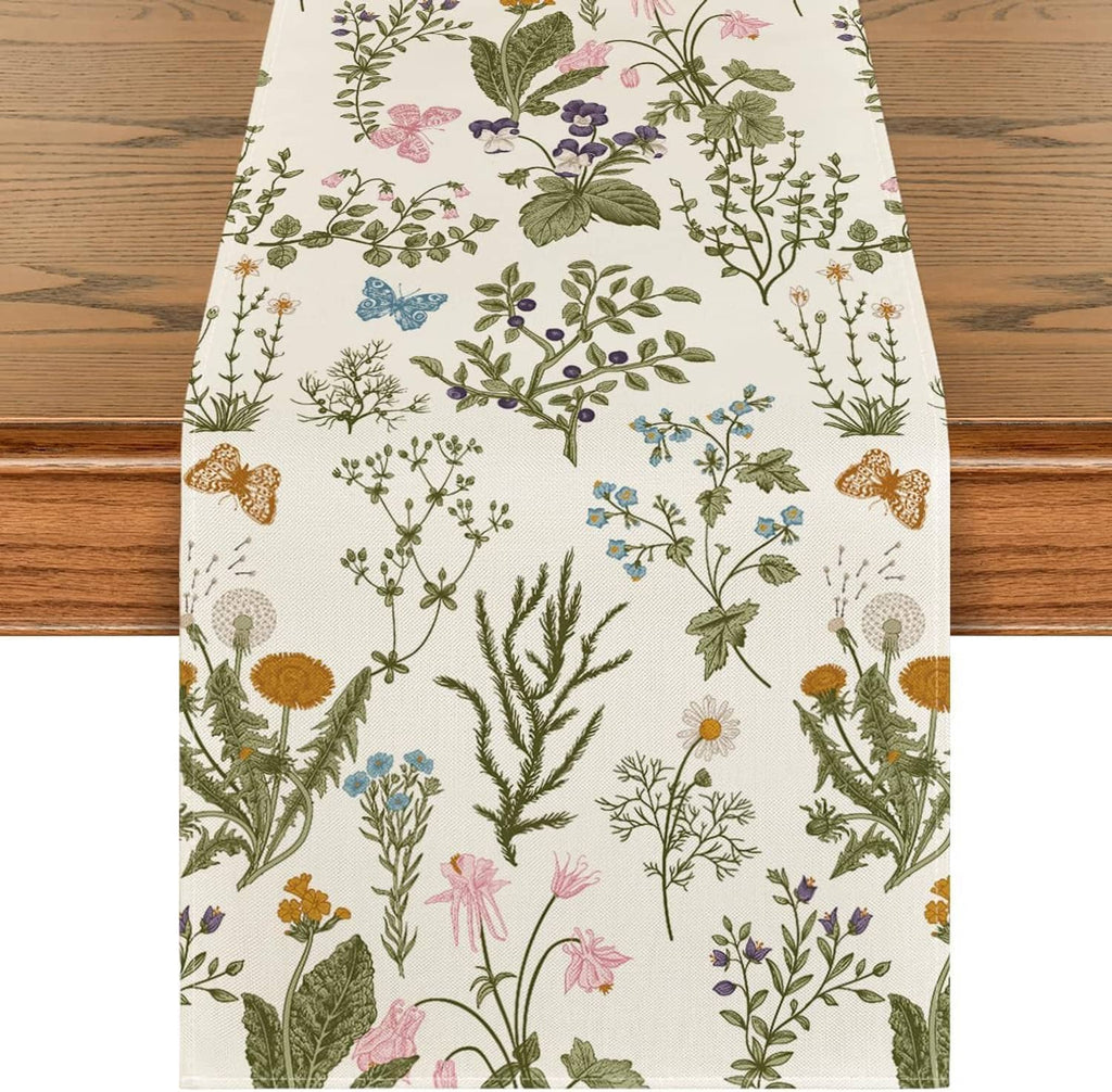 Floral table runner with butterfly and wildflower branches on cream fabric