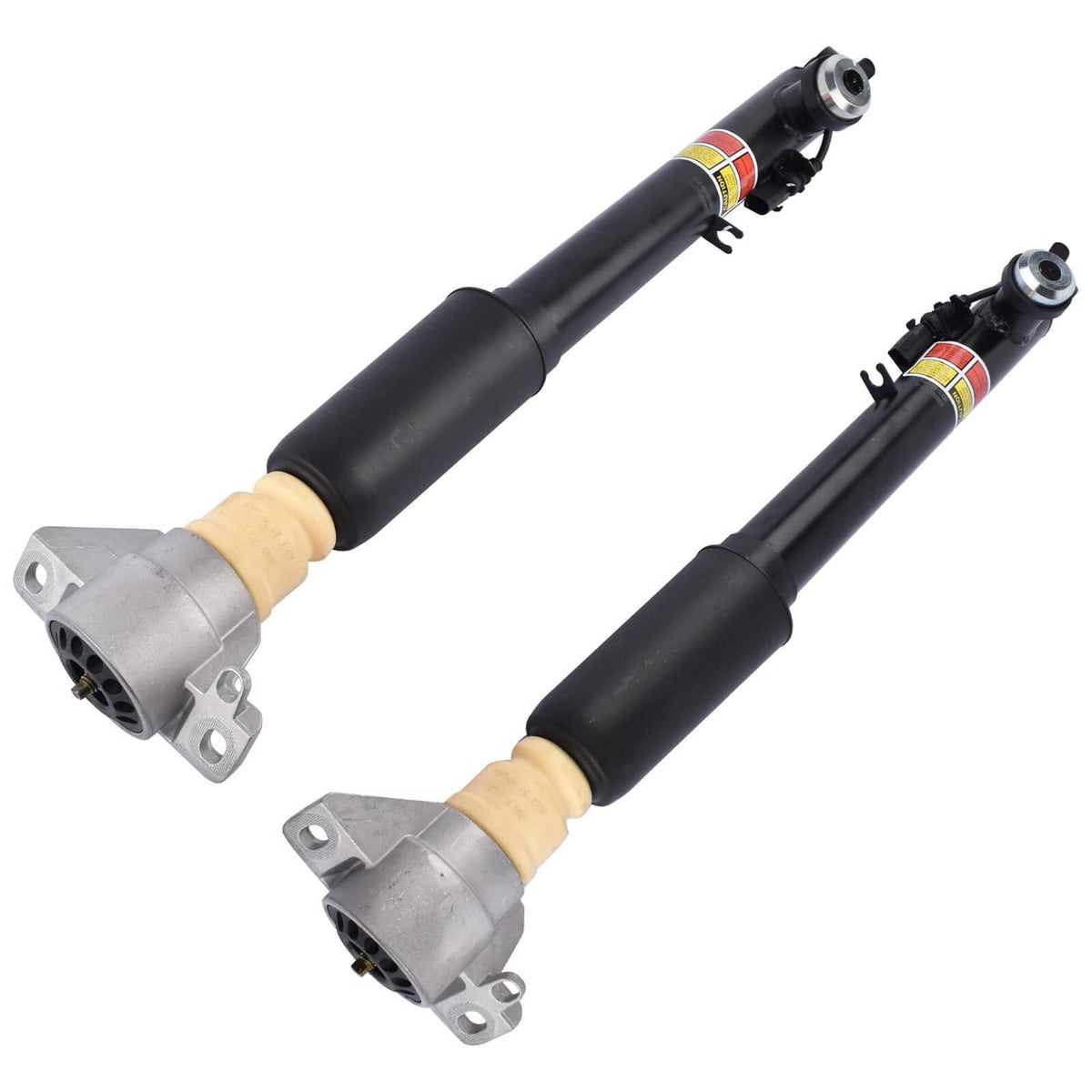 Two electronic shock struts angled view with gray end mounts and beige damper caps.