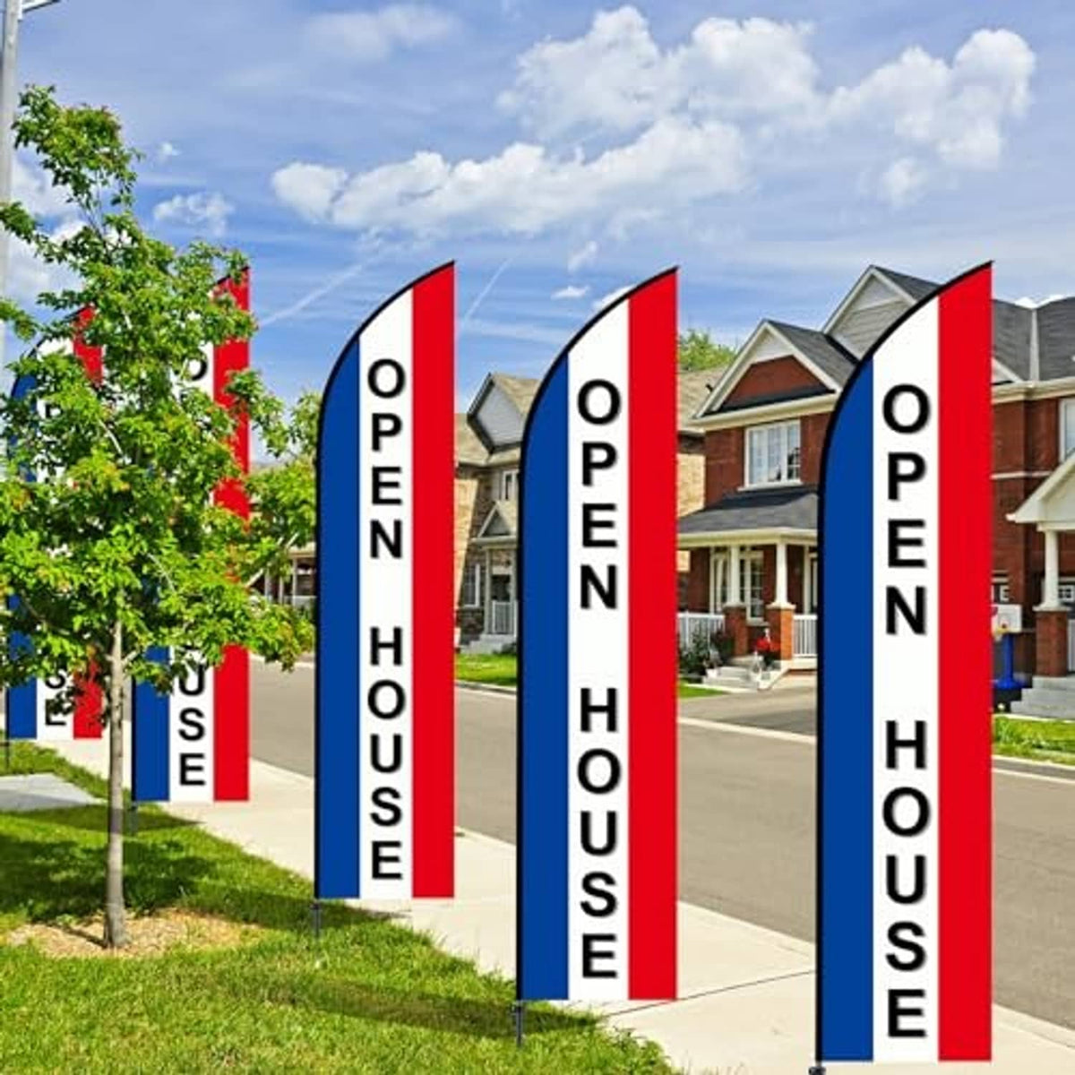 Pair of feather flags with OPEN HOUSE text, blue/red panels on portable poles