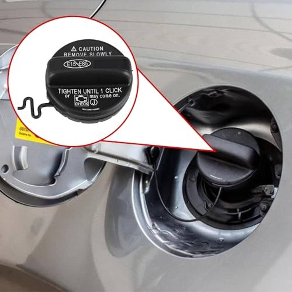 Fuel tank filler area with black gas cap and warning label, shown near the opening
