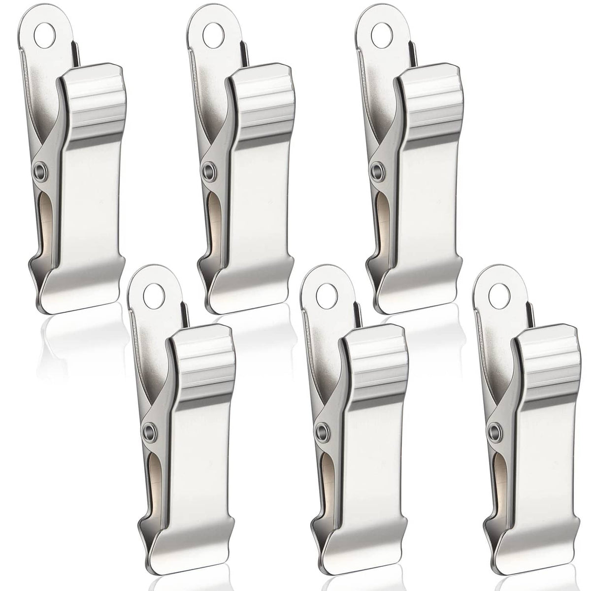 Set of silver metal mini crocodile spring clamps with alligator-style jaws