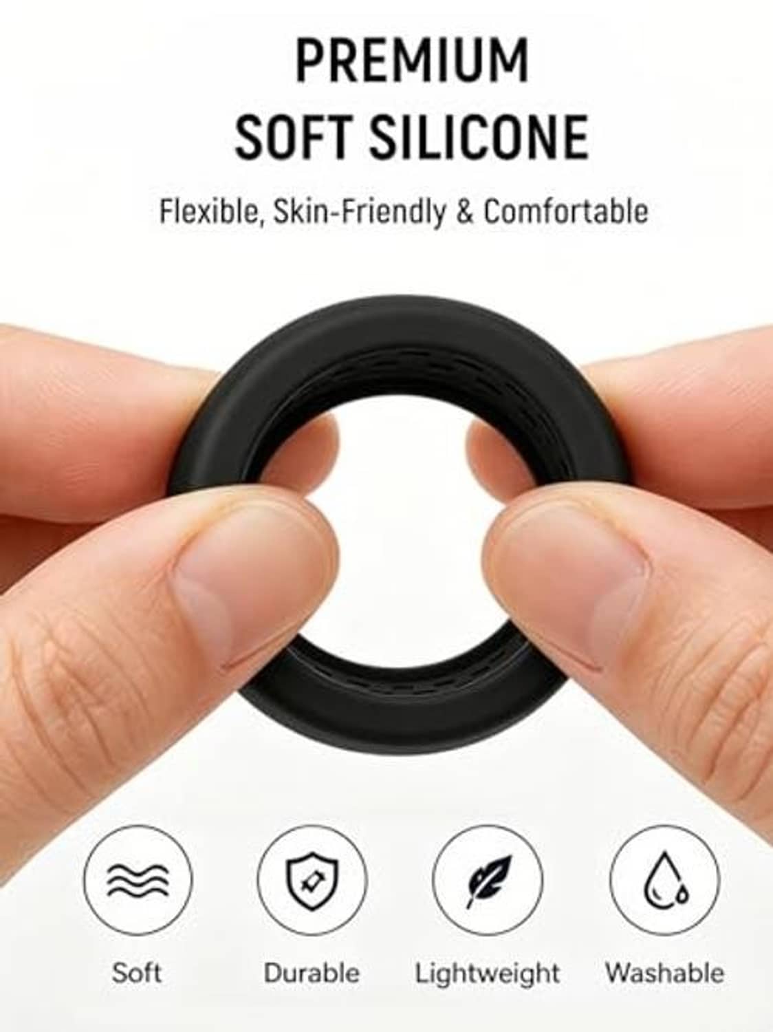 Soft black silicone Oura ring case held between fingers