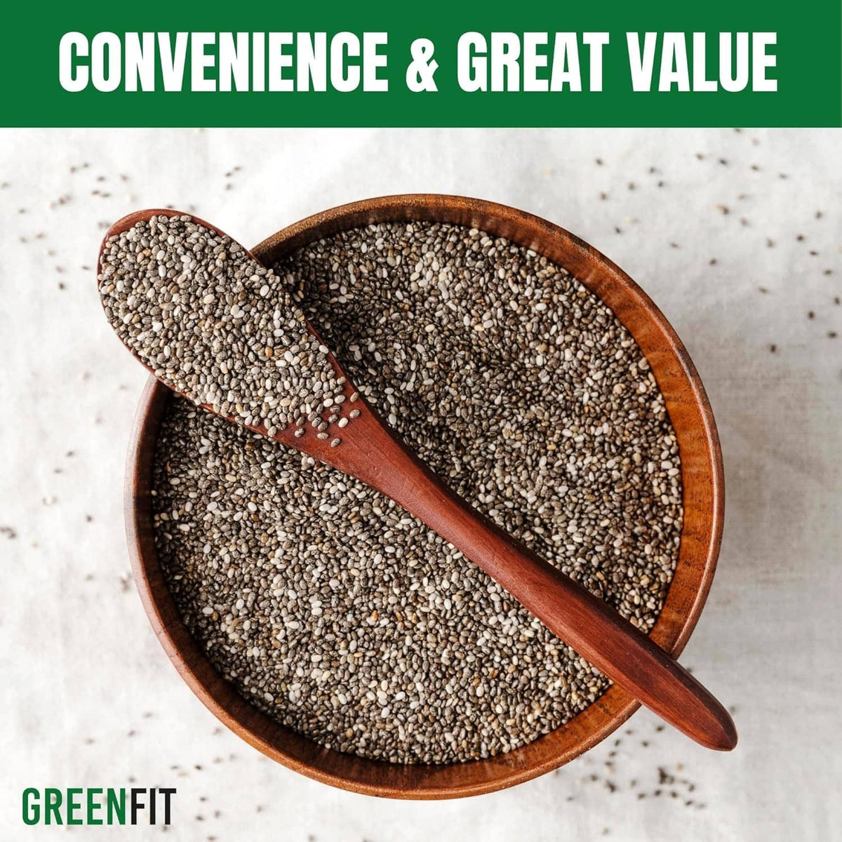 Chia seeds in wooden spoons, grey-black speckled seeds ready to scoop