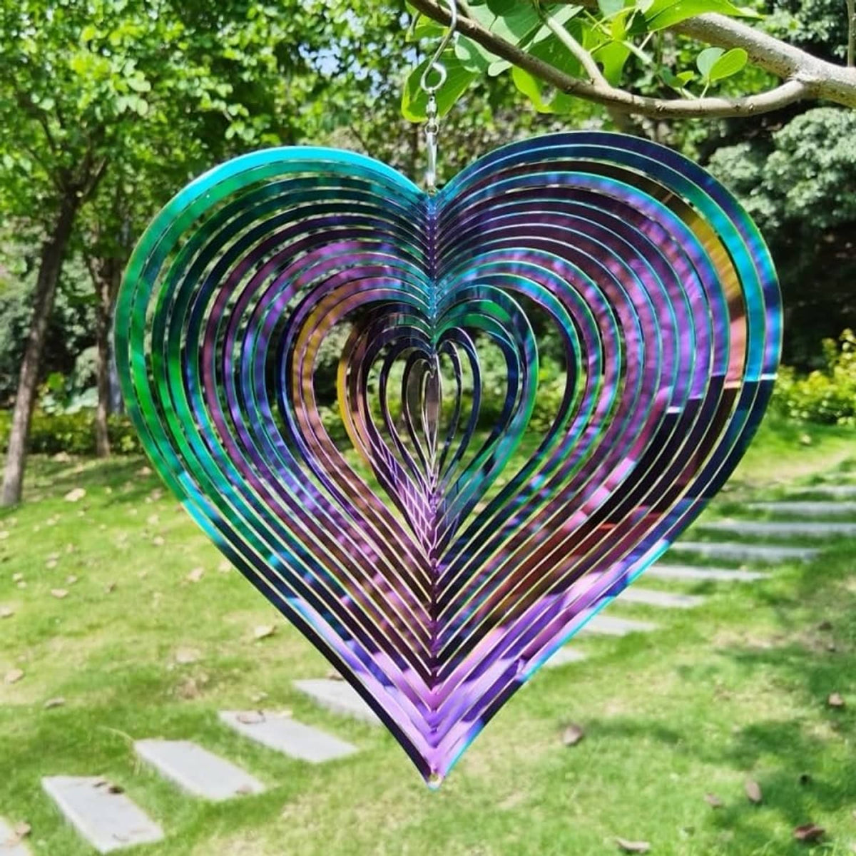 Heart wind chime spinner in rainbow iridescent metal with blue-to-purple outer rim