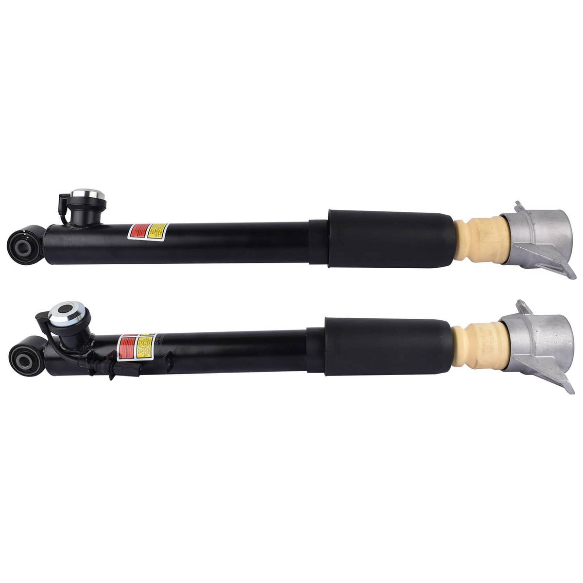 Pair of electronic shock struts with black cylindrical body, beige top bushing, gray brackets.