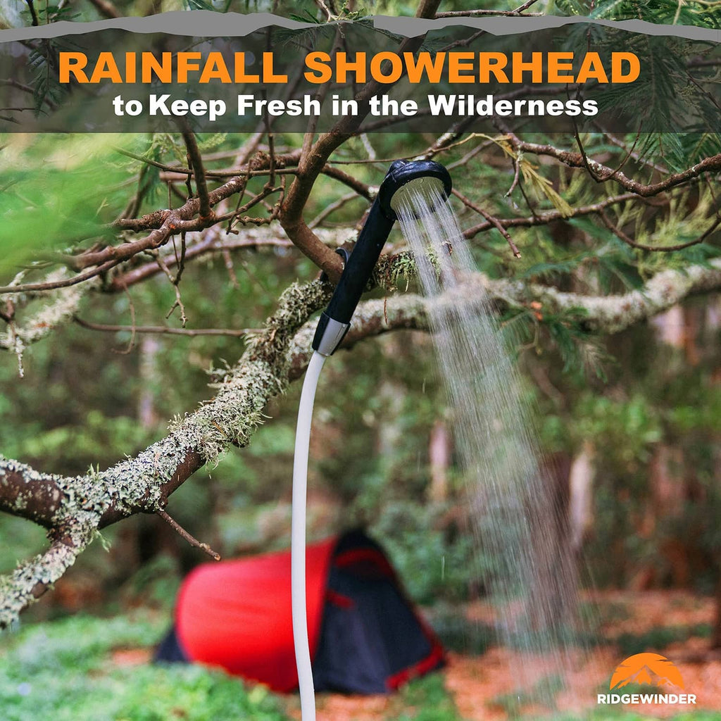 Rainfall-style showerhead spraying from the portable camp shower hose in the outdoors