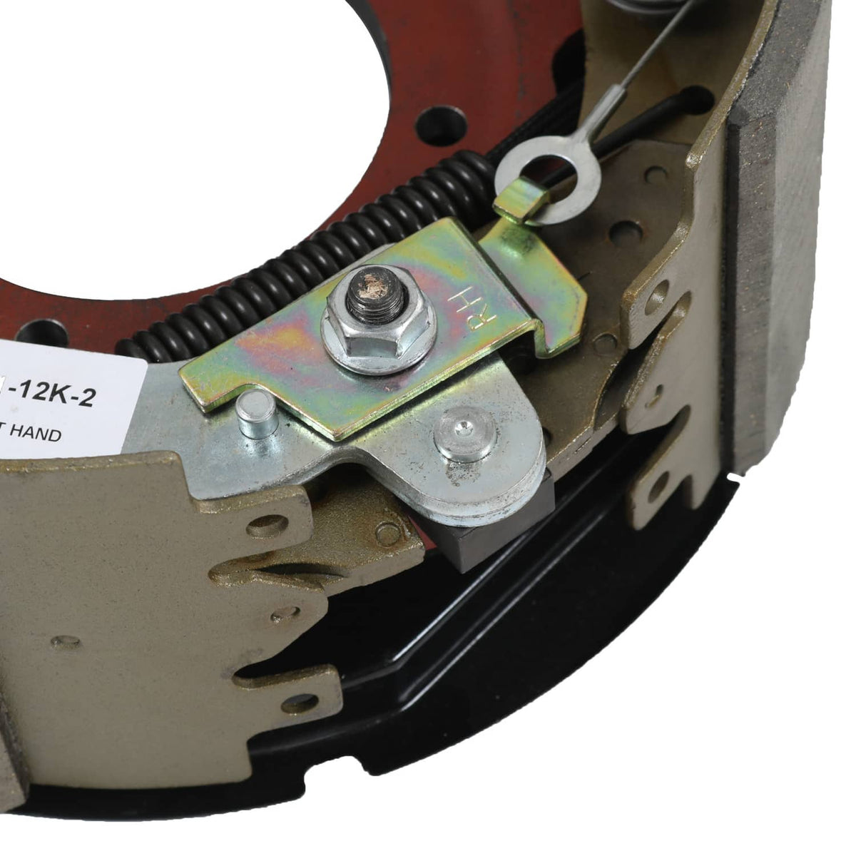 Electric trailer brake backing plate assembly close-up of mounting bracket and wires