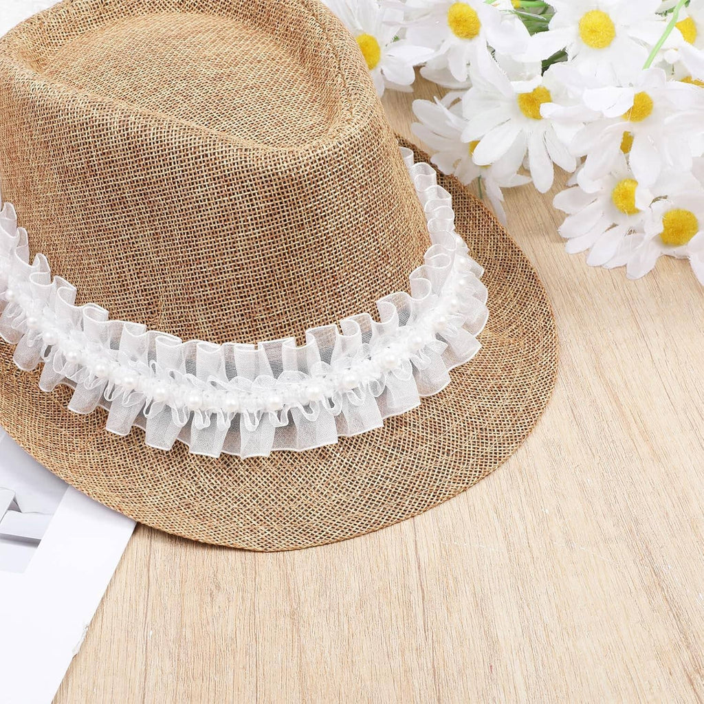 White pearl ruffle lace trim curled on a spool, with small bead embellishments