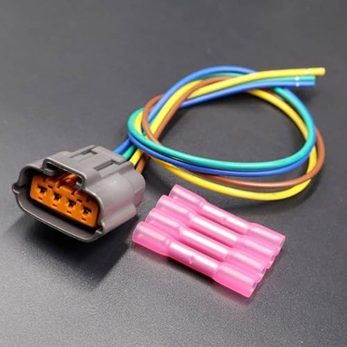 TPS wire pigtail with gray connector, multicolor wires, and pink protective crimp sleeves