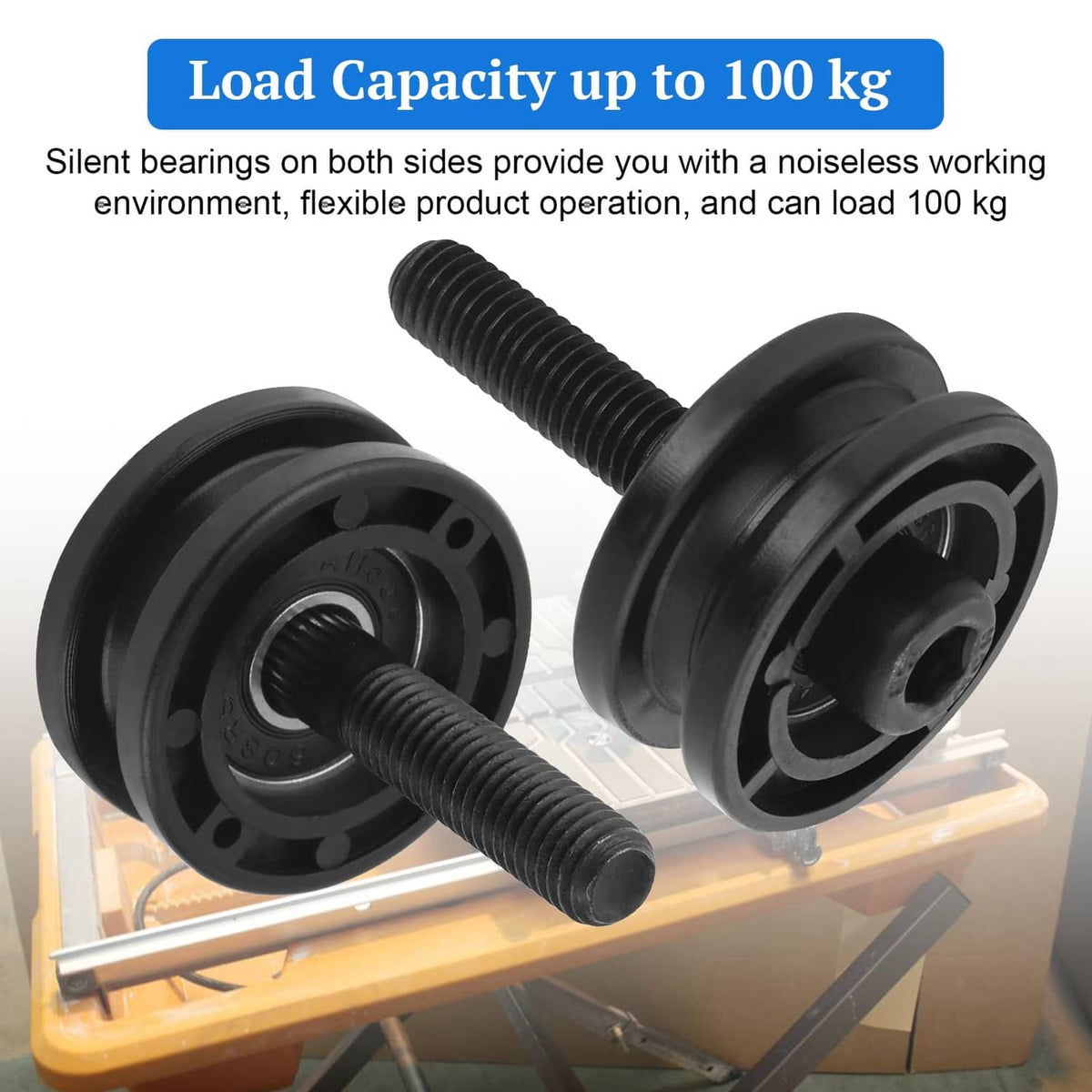 Pair of black tile saw roller assemblies with threaded posts