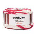 Super bulky chenille yarn skein with red and white stripe pattern, soft polyester