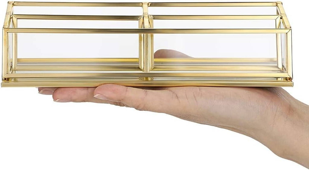 Gold 4-slot business card holder with clear glass front, held in a hand